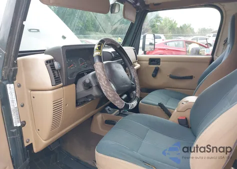 2002 Jeep Wrangler Sahara z USA, uszkodzony, nr VIN 1J4FA59S52P735442